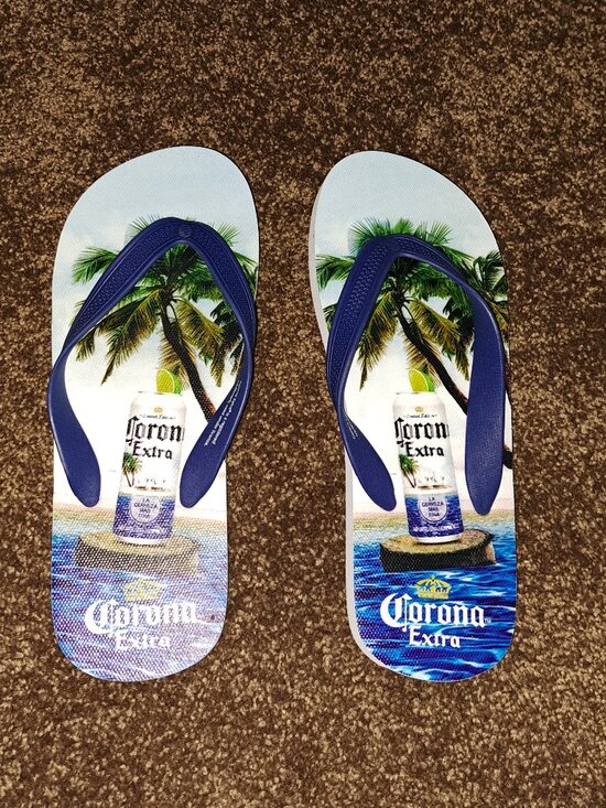 Corona Other - Corona Extra flip-flops featuring a tropical palm tree&beer bottle graphic sole